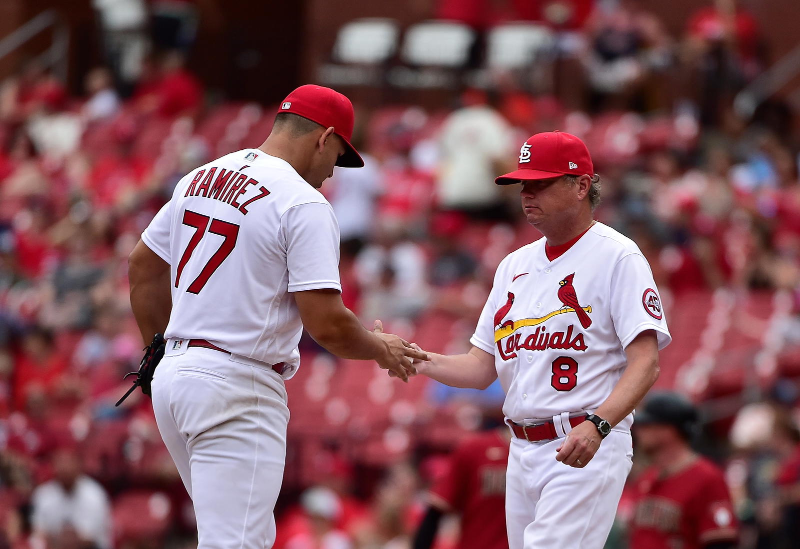 St. Louis Cardinals manager Mike Shildt (8) removes relief pitcher Roel Ramirez (77) from the game during the eighth inning against the Arizona Diamondbacks at Busch Stadium. Jeff Curry-Imagn Images