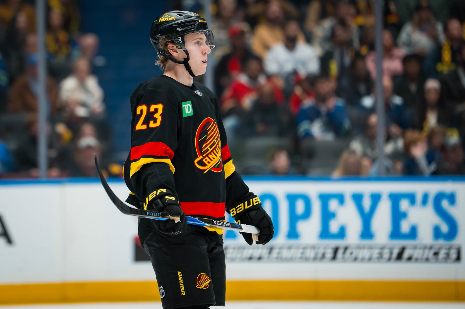 Oct 9, 2025; Vancouver, British Columbia, CAN; Vancouver Canucks forward Jonathan Lekkerimaki (23) during a stop in play against the Calgary Flames in the third period at Rogers Arena. Mandatory Credit: Bob Frid-Imagn Images