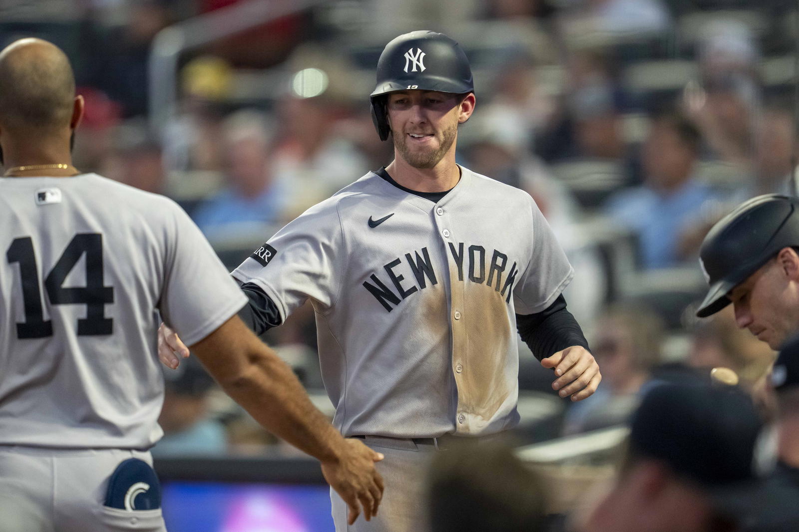 New York Yankees third baseman Ryan McMahon celebrates with infielder Amed Rosario. Credit: Jesse Johnson-Imagn Images.
