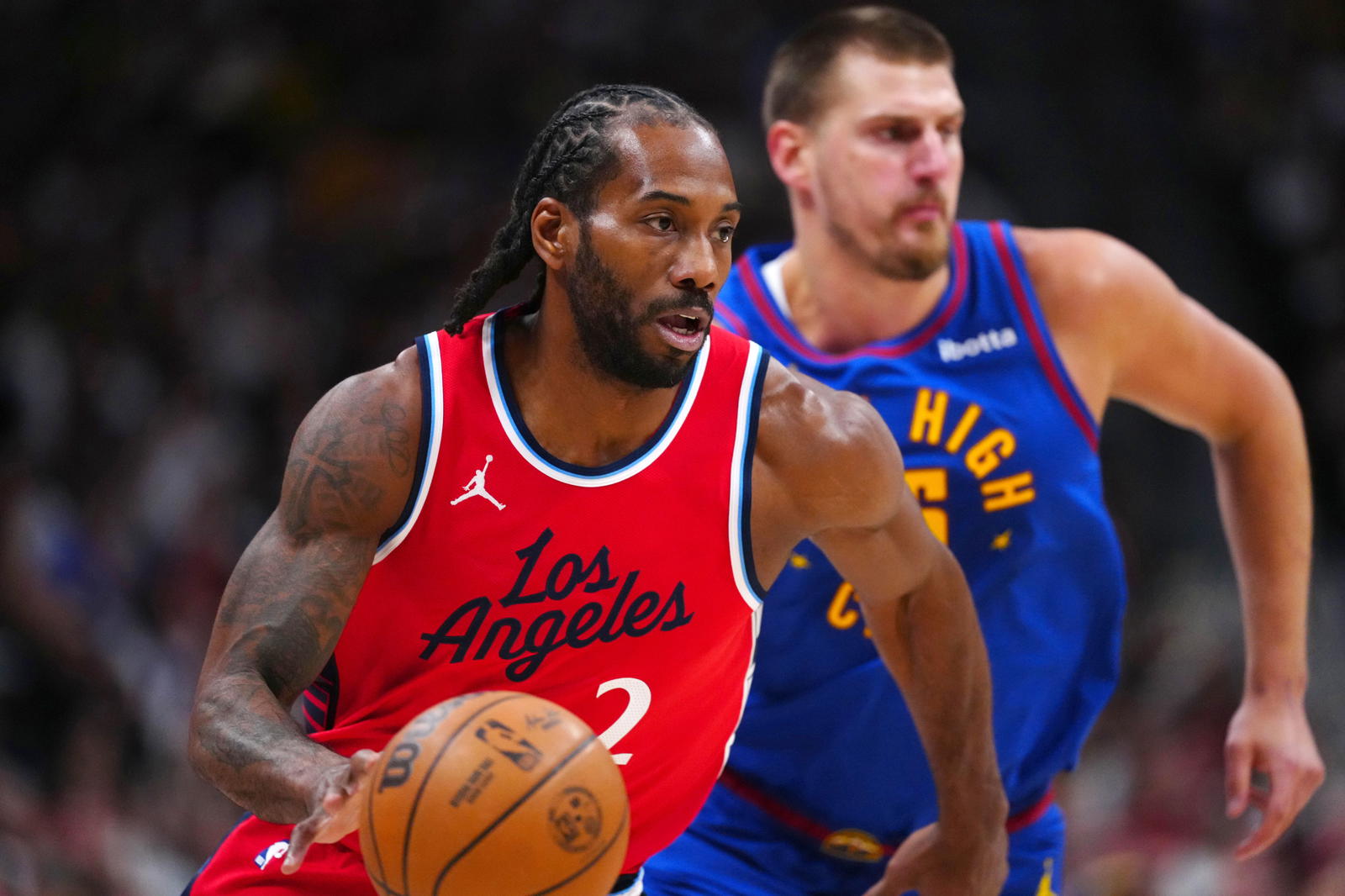 LA Clippers forward Kawhi Leonard (2) controls the ball in the first quarter against the Denver Nuggets during game seven of first round for the 2025 NBA Playoffs at Ball Arena.&nbsp;Ron Chenoy-Imagn Images