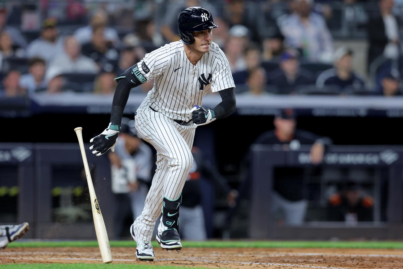 Sep 11, 2025; Bronx, New York, USA; New York Yankees center fielder Cody Bellinger (35) follows through on an RBI single against the Detroit Tigers during the fourth inning at Yankee Stadium. Mandatory Credit: Brad Penner-Imagn Images