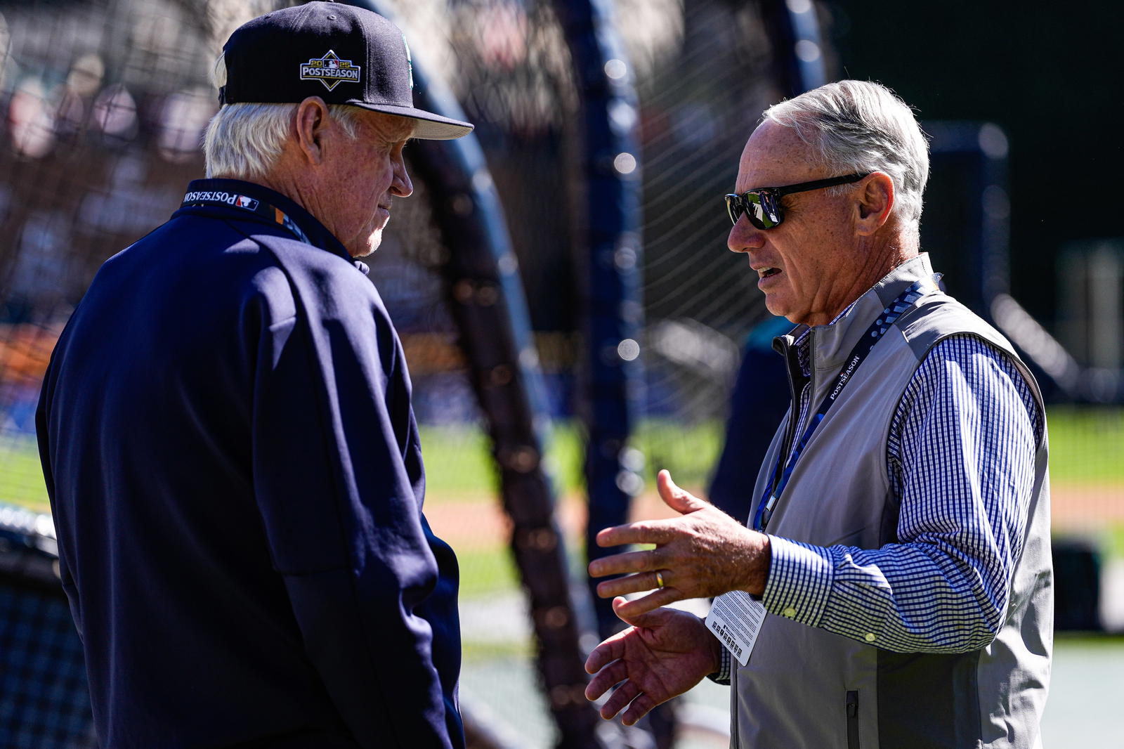 CEO of Seattle Mariners John Stanton, left, talks to MLB Commissioner Rob Manfred before ALDS Game 4 between Detroit Tigers and Seattle Mariners at Comerica Park in Detroit on Wednesday, Oct. 8, 2025.