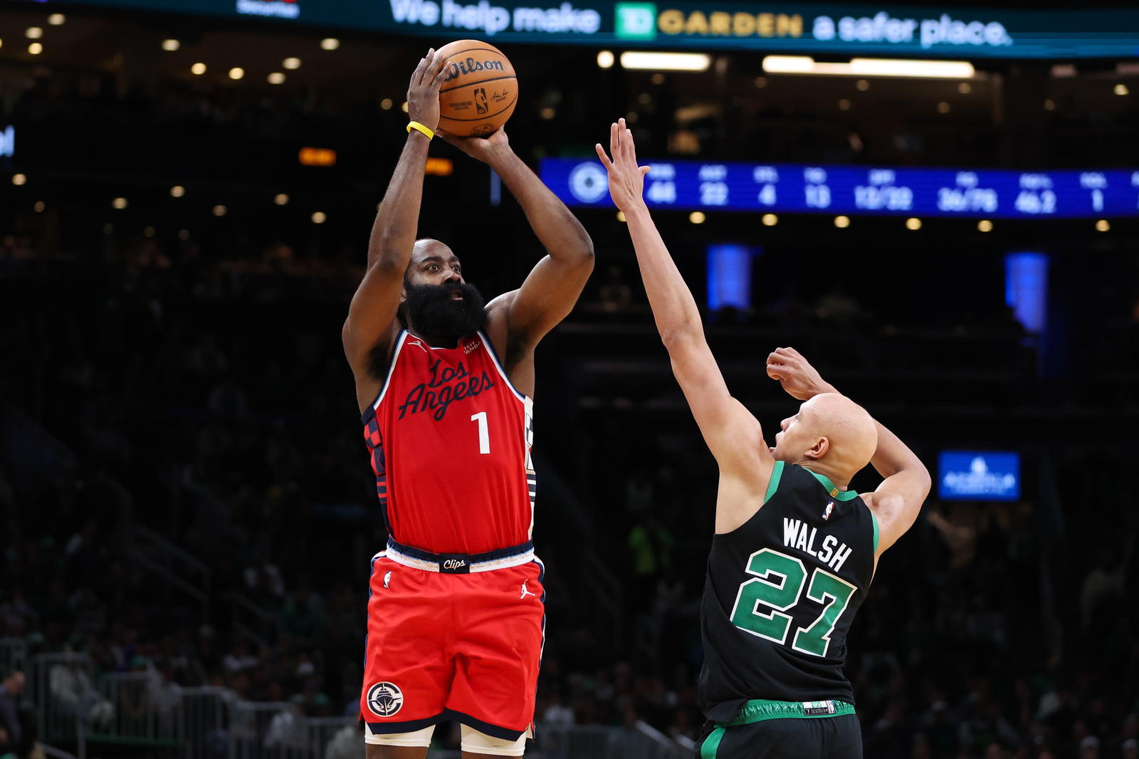 Nov 16, 2025; Boston, Massachusetts, USA; Los Angeles Clippers guard James Harden (1) shoots defended by Boston Celtics forward Jordan Walsh (27) during the second half at TD Garden. (Paul Rutherford/Imagn Images)