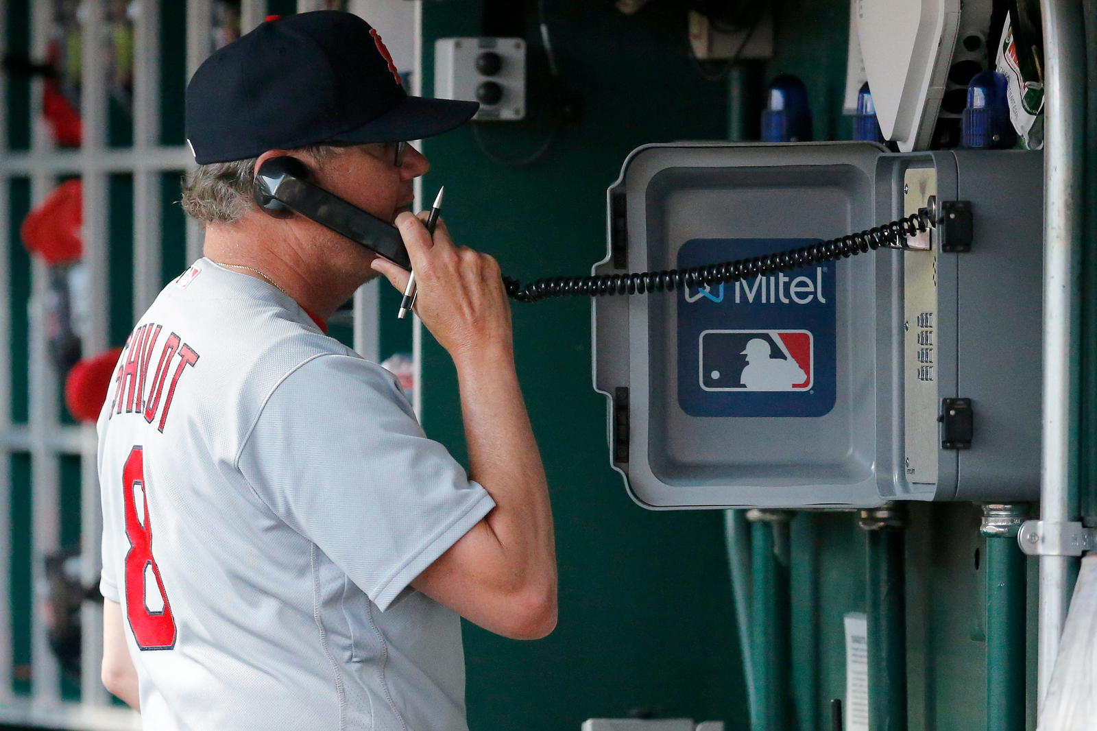 St. Louis Cardinals manager Mike Shildt (8) makes a call from the dugout in the fourth inning of the MLB National League game between the Cincinnati Reds and the St. Louis Cardinals at Great American Ball Park in downtown Cincinnati on Friday, July 23, 2021. St Louis Cardinals At Cincinnati Reds
