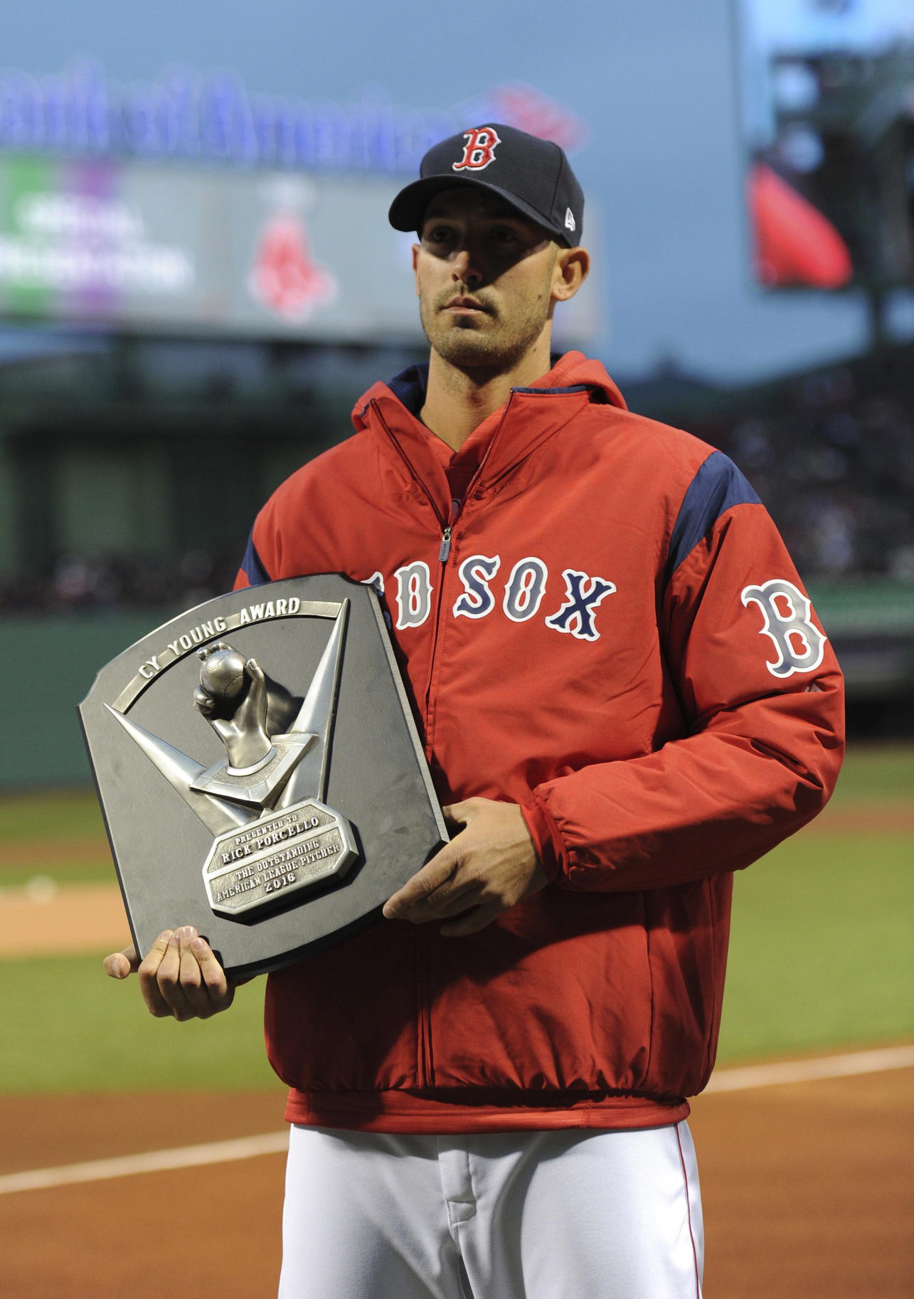 Apr 5, 2017; Boston, MA, USA; Boston Red Sox starting pitcher Rick Porcello (22) is honored with the Cy Young Award prior to a game against the Pittsburgh Pirates at Fenway Park. (Bob DeChiara/Imagn Images)