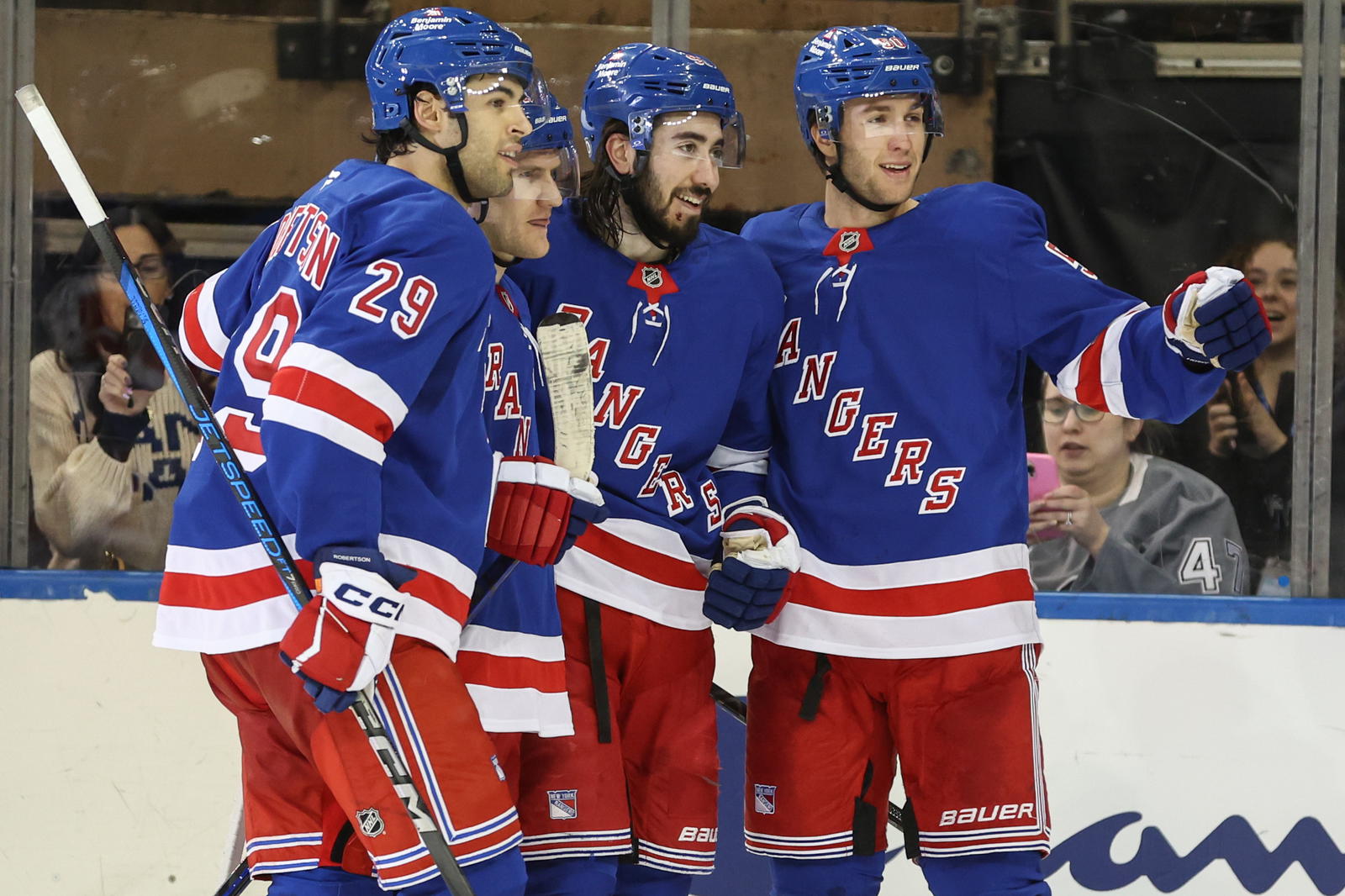 Mika Zibanejad celebrates with his teammates after scoring a goal in the third period against the Tampa Bay Lightning. (Wendell Cruz-Imagn Images)