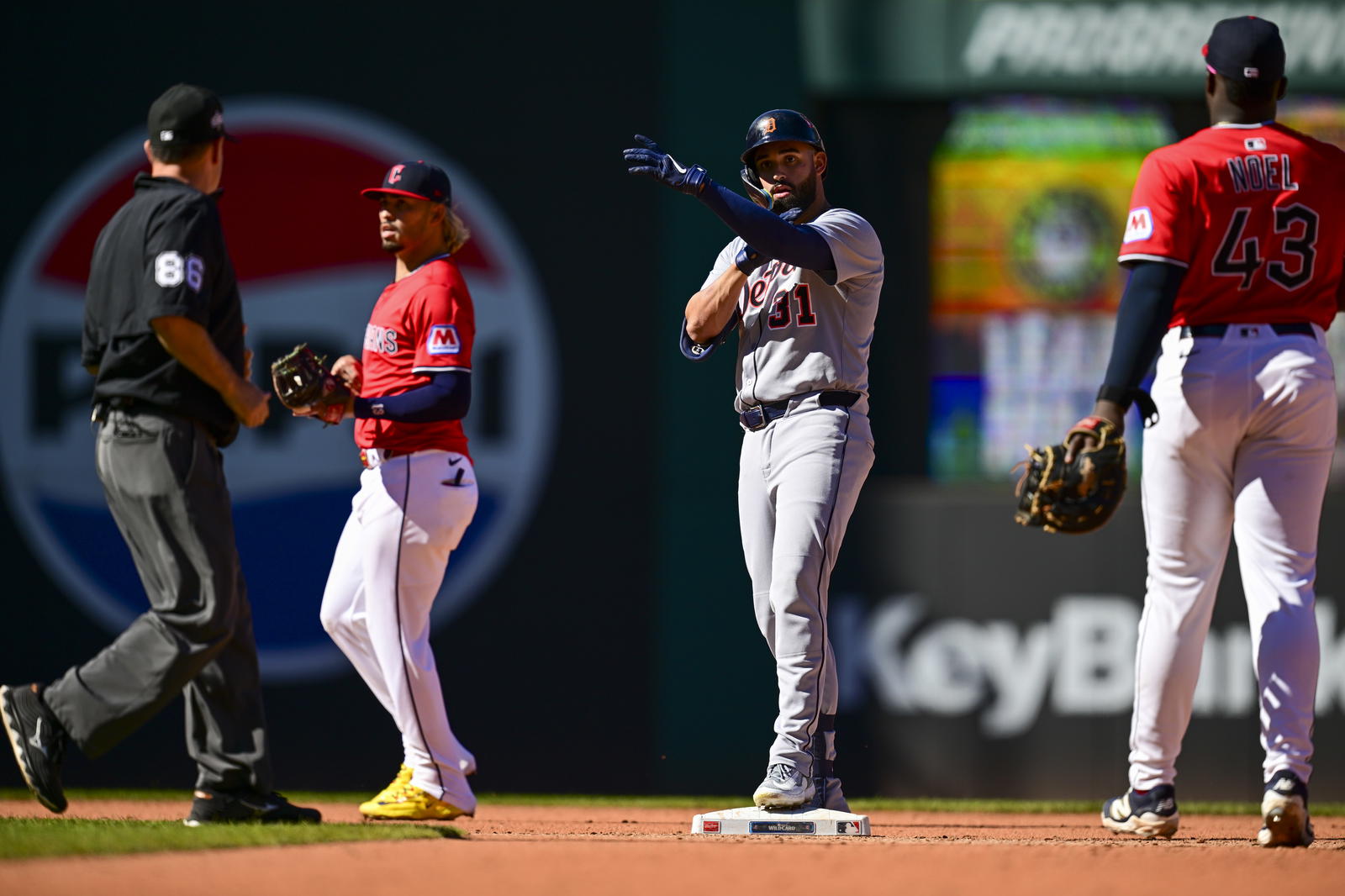 Sep 30, 2025; Cleveland, Ohio, USA; Detroit Tigers outfielder Riley Greene (31) celebrates after hitting a double against the Cleveland Guardians in the seventh inning during game one of the Wildcard round for the 2025 MLB playoffs at Progressive Field. Mandatory Credit: David Dermer-Imagn Images