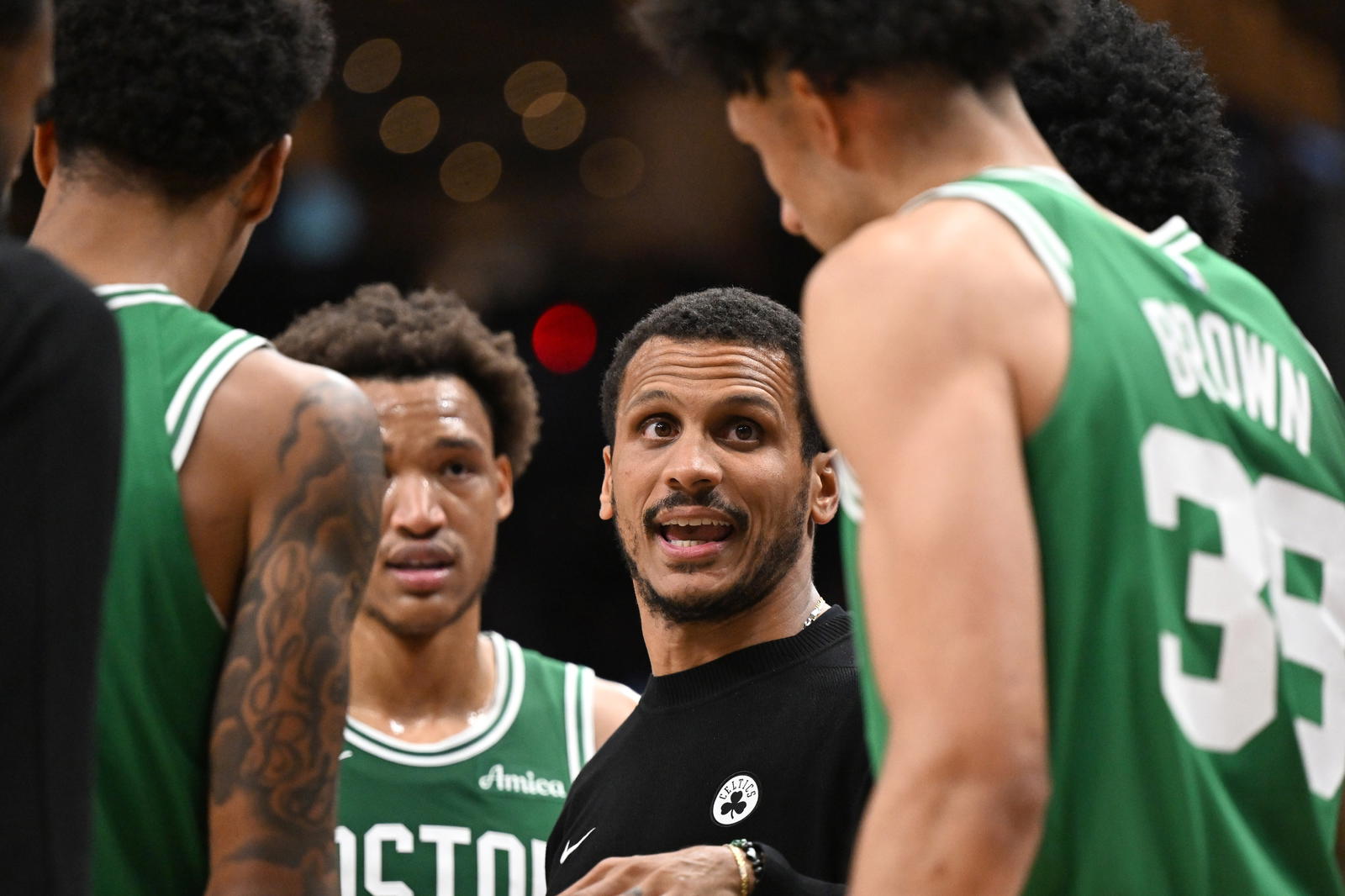 Oct 10, 2025; Toronto, Ontario, CAN; Boston Celtics head coach Joe Mazzulla speaks with his players in the second half against the Toronto Raptors at Scotiabank Arena. (Dan Hamilton/Imagn Images)