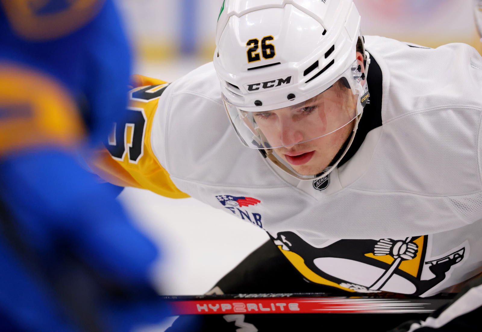 Sep 21, 2024; Buffalo, New York, USA; Pittsburgh Penguins center Tristan Broz (26) waits for the face-off during the first period against the Buffalo Sabres at KeyBank Center. Mandatory Credit: Timothy T. Ludwig-Imagn Images