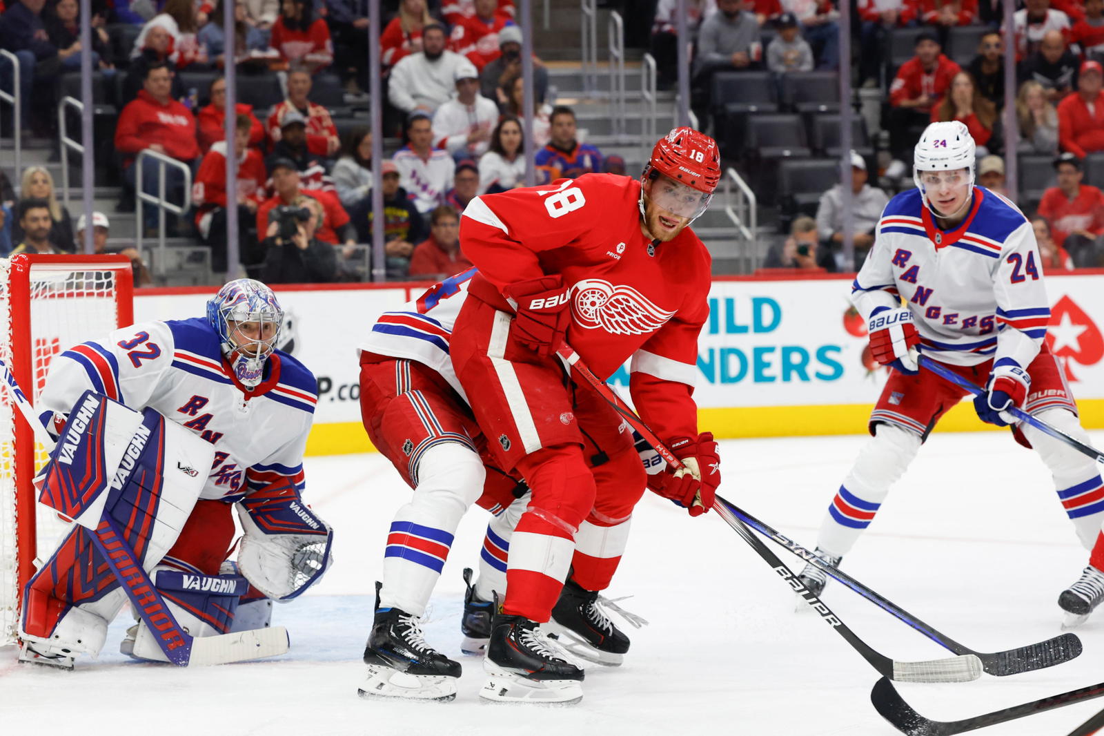 Oct 17, 2024; Detroit, Michigan, USA; Detroit Red Wings center Andrew Copp (18) fight for position in front of New York Rangers goaltender Jonathan Quick (32) in the second period at Little Caesars Arena. (Rick Osentoski, Imagn Images)