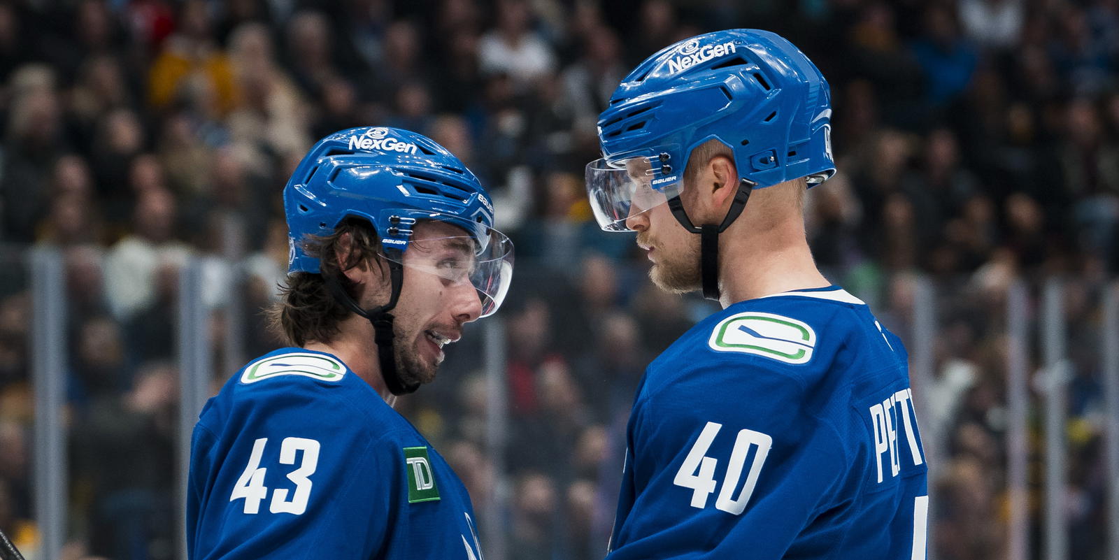 Quinn Hughes and Elias Pettersson (Bob Frid-Imagn Images)
