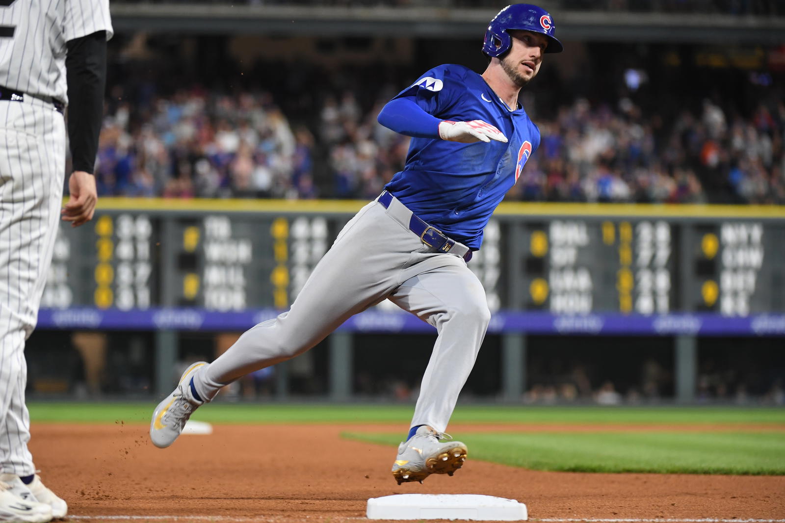 Chicago Cubs outfielder Kyle Tucker (30) rounds third base and scores during the fifth inning against the Colorado Rockies at Coors Field. Christopher Hanewinckel-Imagn Images