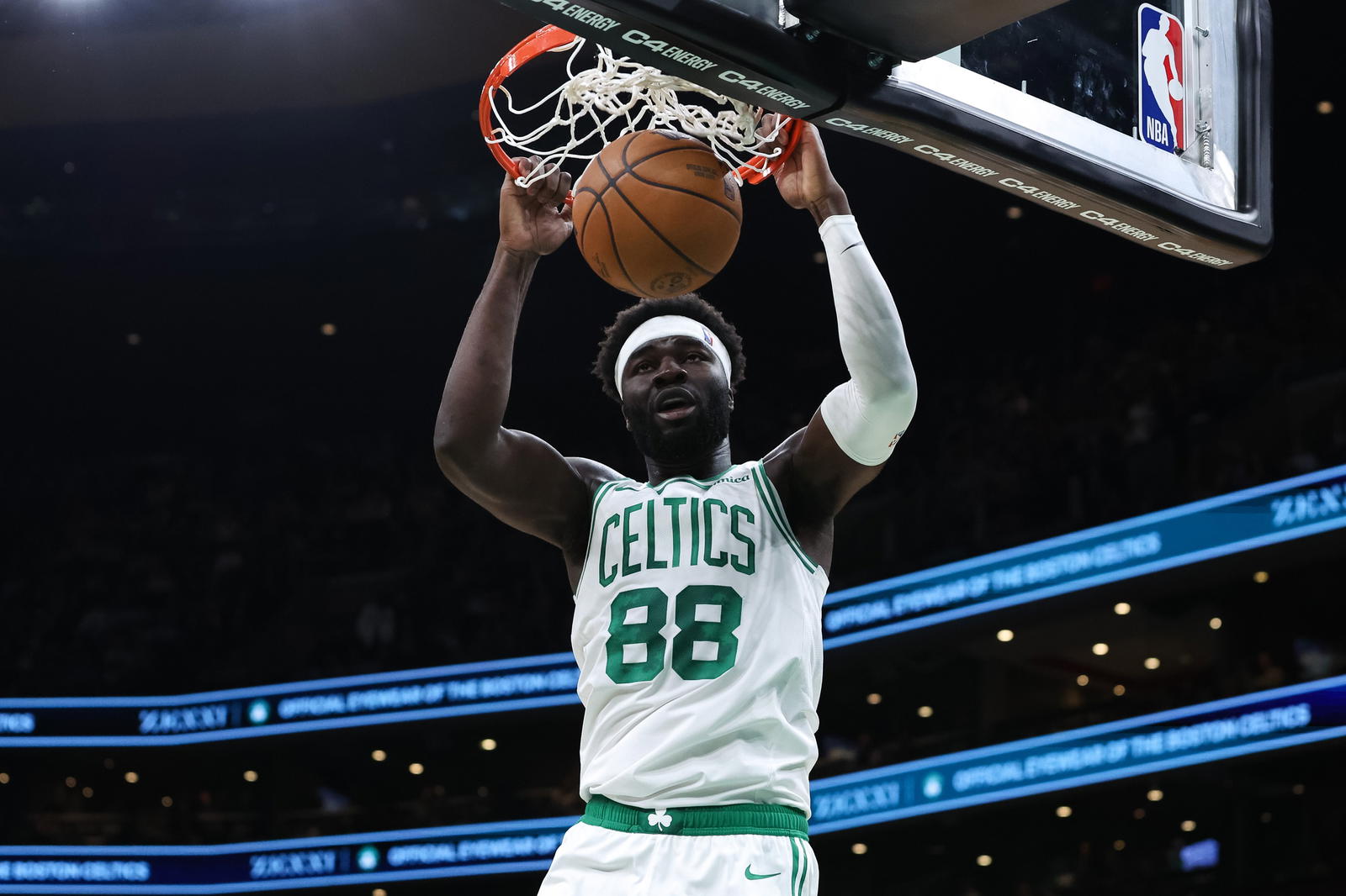 Oct 15, 2025; Boston, Massachusetts, USA; Boston Celtics center Neemias Queta (88) dunks the ball during the first half against the Toronto Raptors at TD Garden. (Paul Rutherford/Imagn Images)