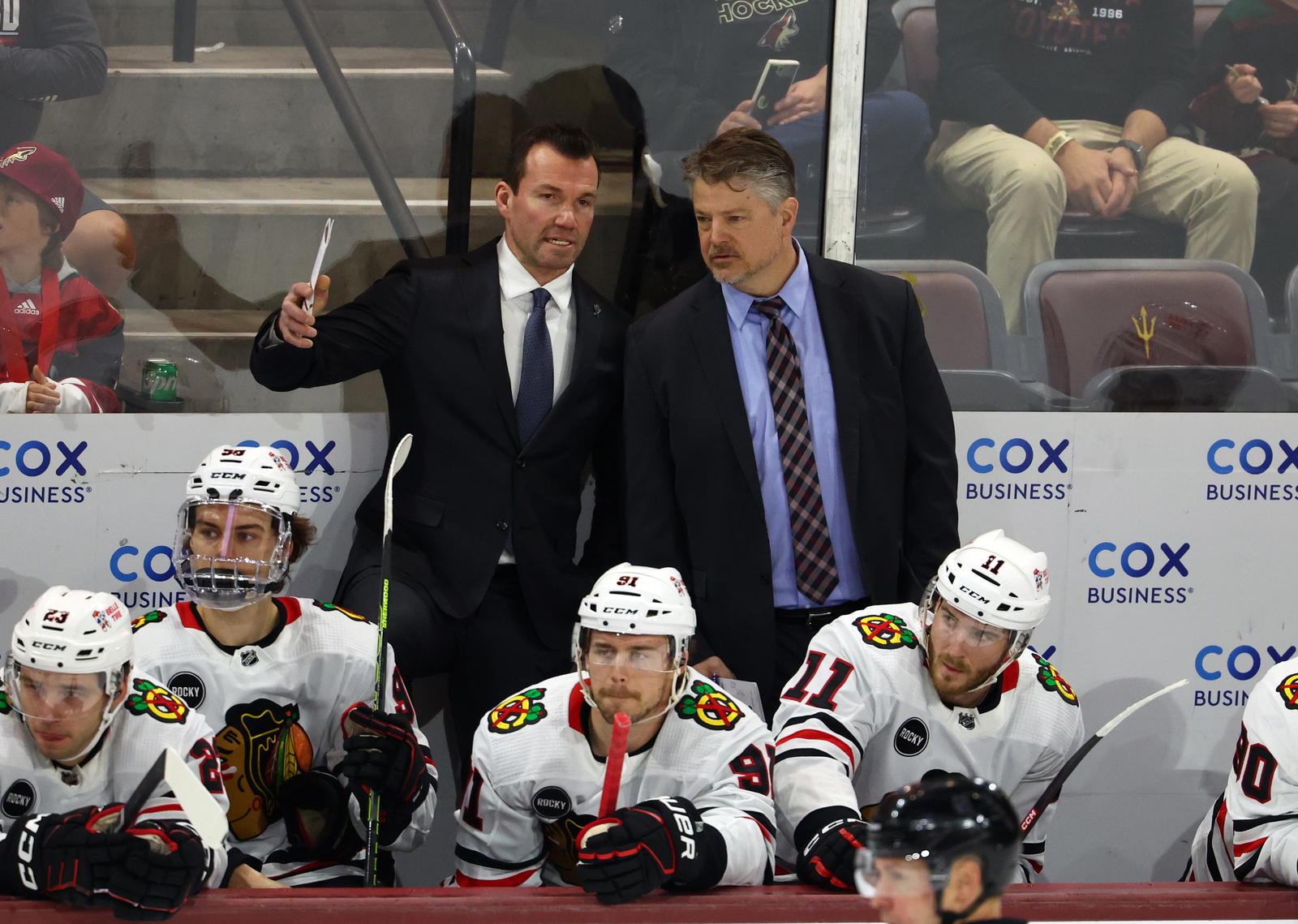 Mar 5, 2024; Tempe, Arizona, USA; Chicago Blackhawks head coach Luke Richardson (left) with assistant coach Kevin Dean against the Arizona Coyotes at Mullett Arena. Mandatory Credit: Mark J. Rebilas-USA TODAY Sports