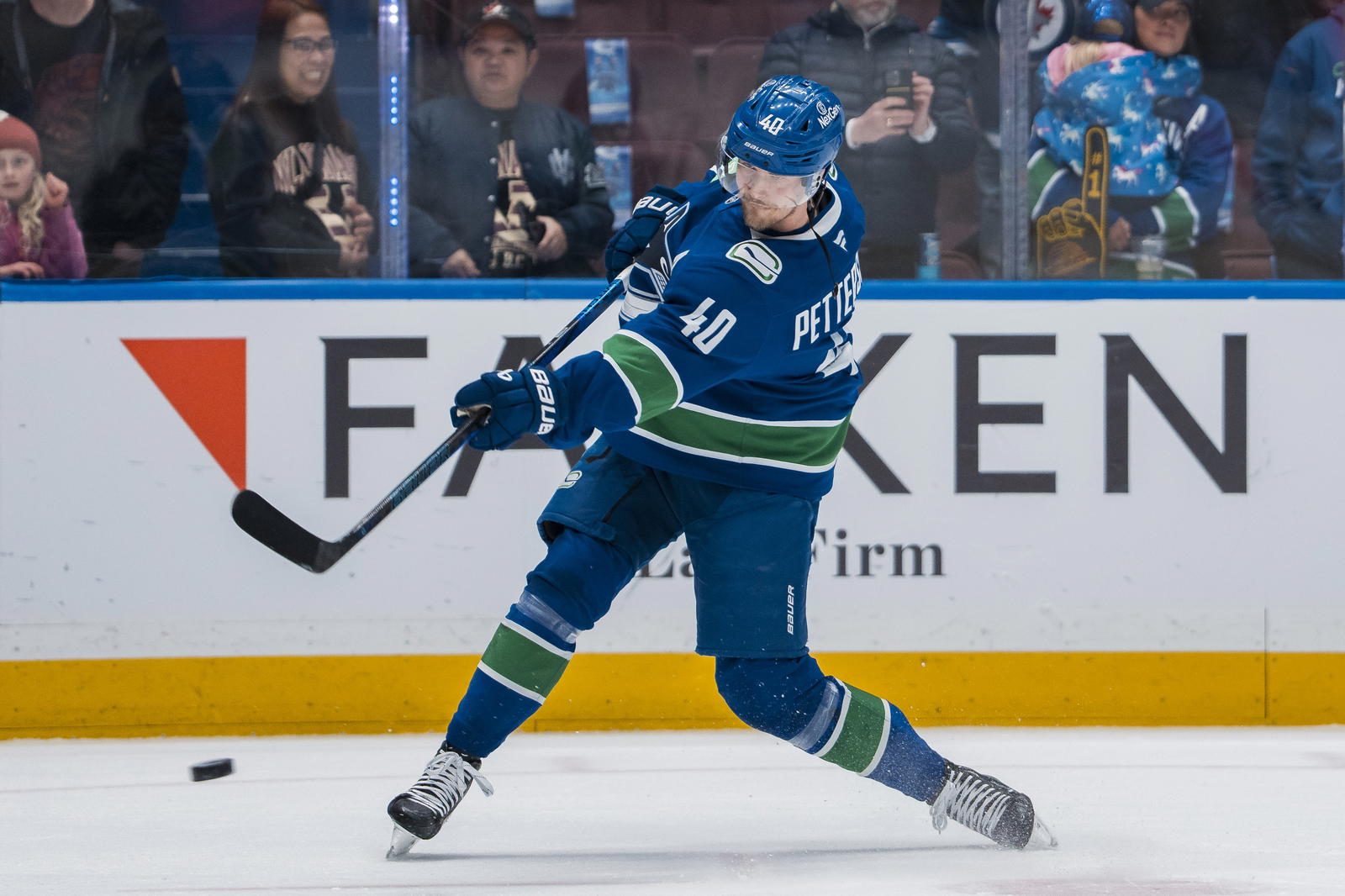 Mar 18, 2025; Vancouver, British Columbia, CAN; Vancouver Canucks forward Elias Pettersson (40) shoots during warm up prior to a game against the Winnipeg Jets at Rogers Arena. Mandatory Credit: Bob Frid-Imagn Images