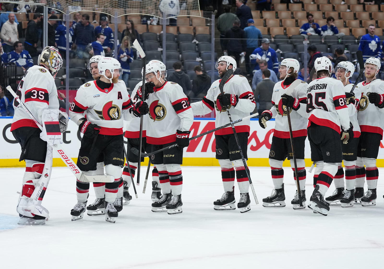 Ottawa Senators players celebrate after defeating the Toronto Maple Leafs during Game 5 of the first round of the 2025 Stanley Cup playoffs. (Nick Turchiaro-Imagn Images)