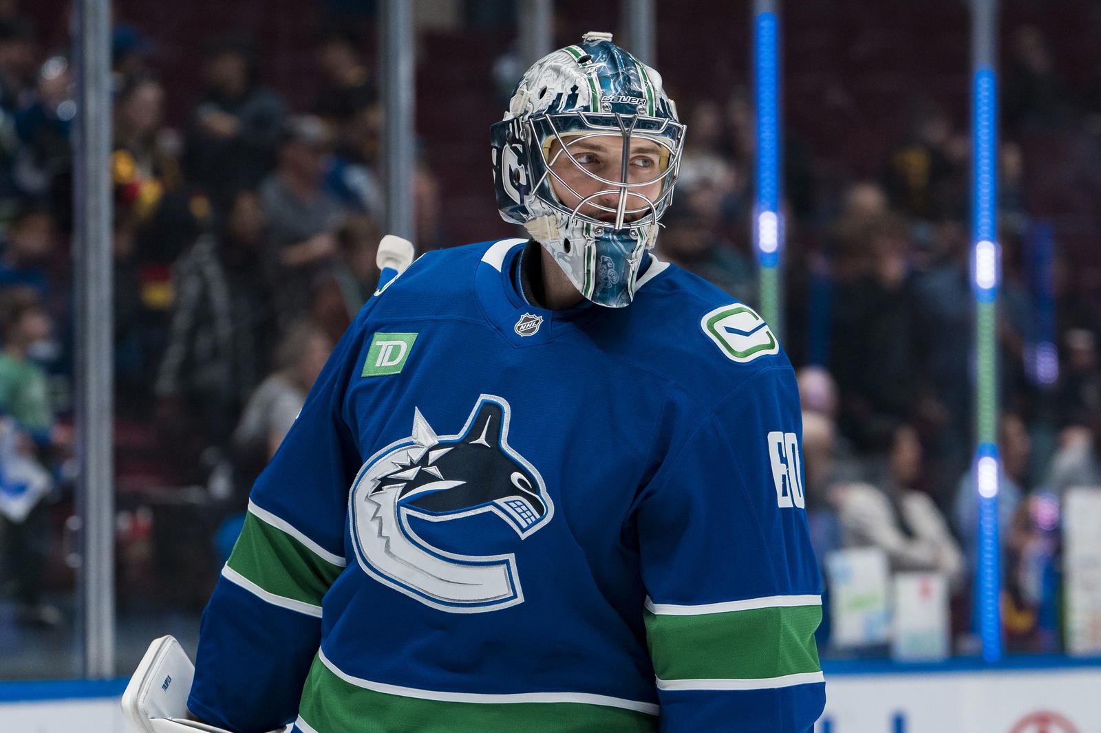 Apr 14, 2025; Vancouver, British Columbia, CAN; Vancouver Canucks goalie Nikita Tolopilo (60) makes his NHL debut in warm prior to a game against the San Jose Sharks at Rogers Arena. Mandatory Credit: Bob Frid-Imagn Images