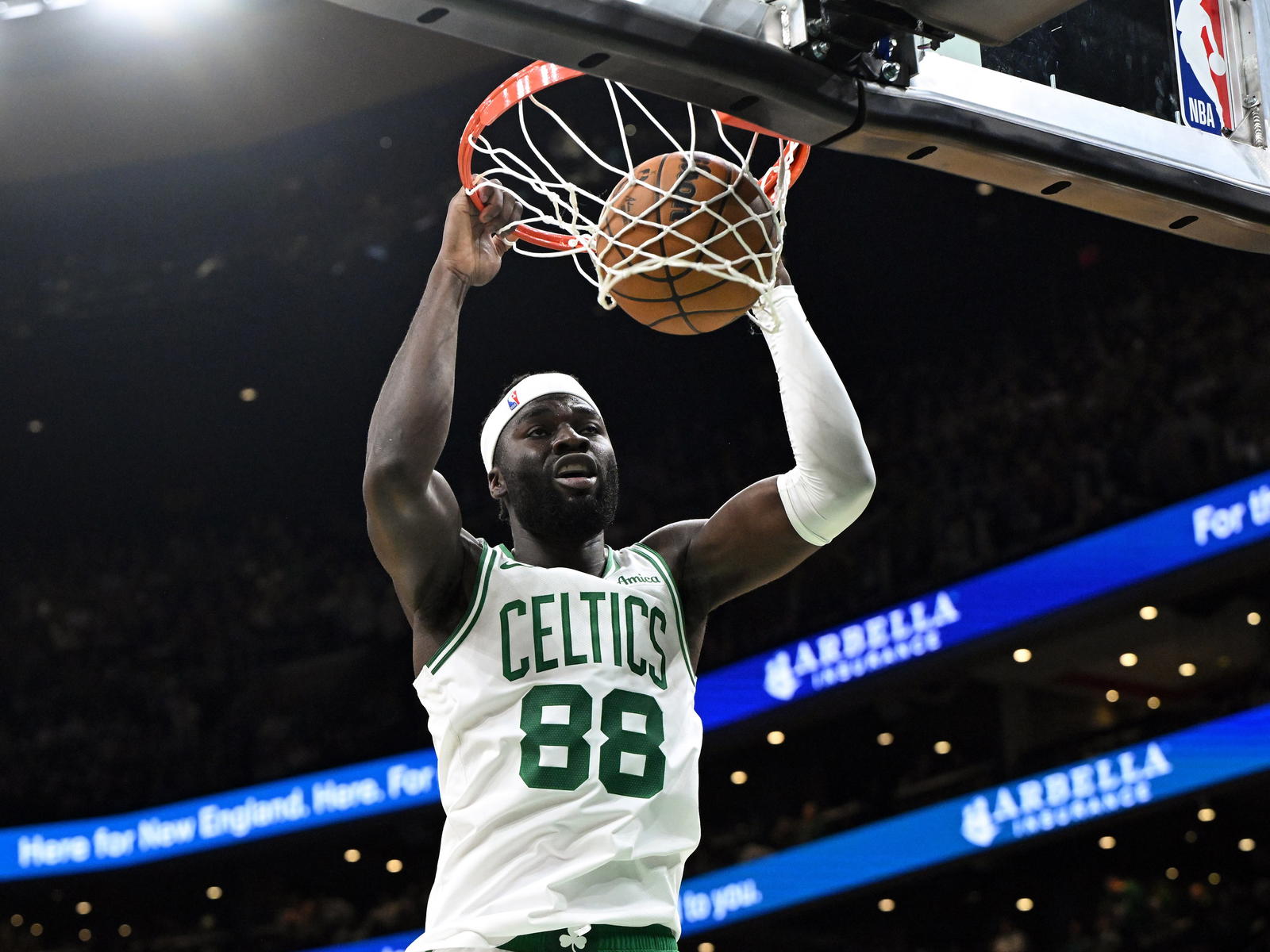 ct 12, 2025; Boston, Massachusetts, USA; Boston Celtics center Neemias Queta (88) dunks the ball against the Cleveland Cavaliers during the first half at TD Garden. (Brian Fluharty-Imagn Images)