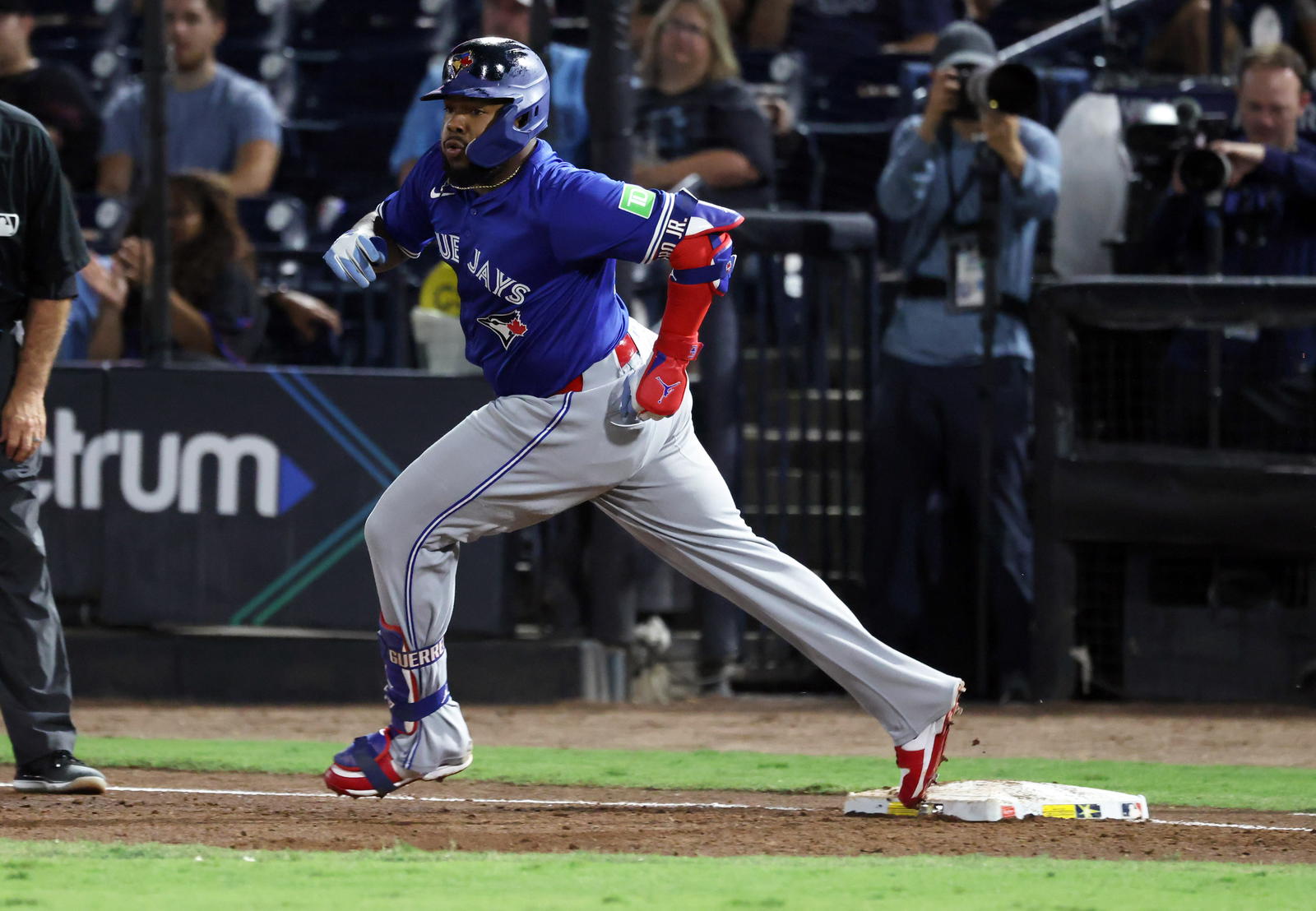 Toronto Blue Jays first baseman Vladimir Guerrero Jr. (27) hits an RBI single during the second inning against the Tampa Bay Rays at George M. Steinbrenner Field. Kim Klement Neitzel-Imagn Images