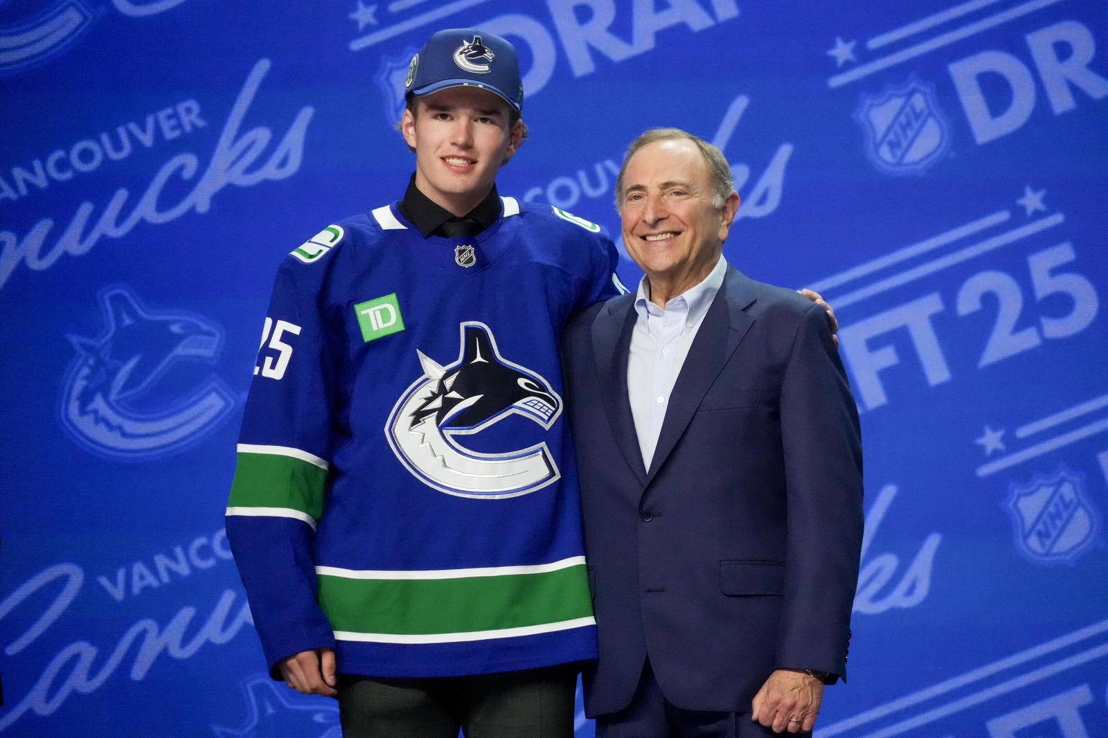 Jun 27, 2025; Los Angeles, California, USA; Braeden Cootes is selected as the 16th overall pick to the Vancouver Canucks in the first round of the 2025 NHL Draft at Peacock Theater. Mandatory Credit: Kirby Lee-Imagn Images
