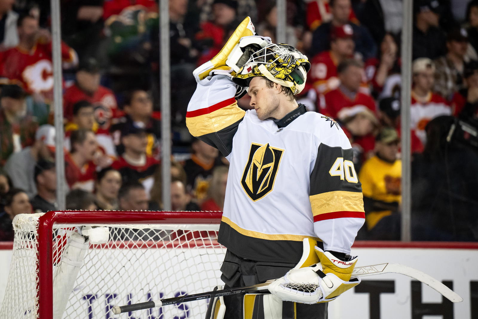 Vegas Golden Knights goaltender Akira Schmid (40) looks on during the second period against the Calgary Flames at Scotiabank Saddledome. Mandatory Credit: Brett Holmes-Imagn Images