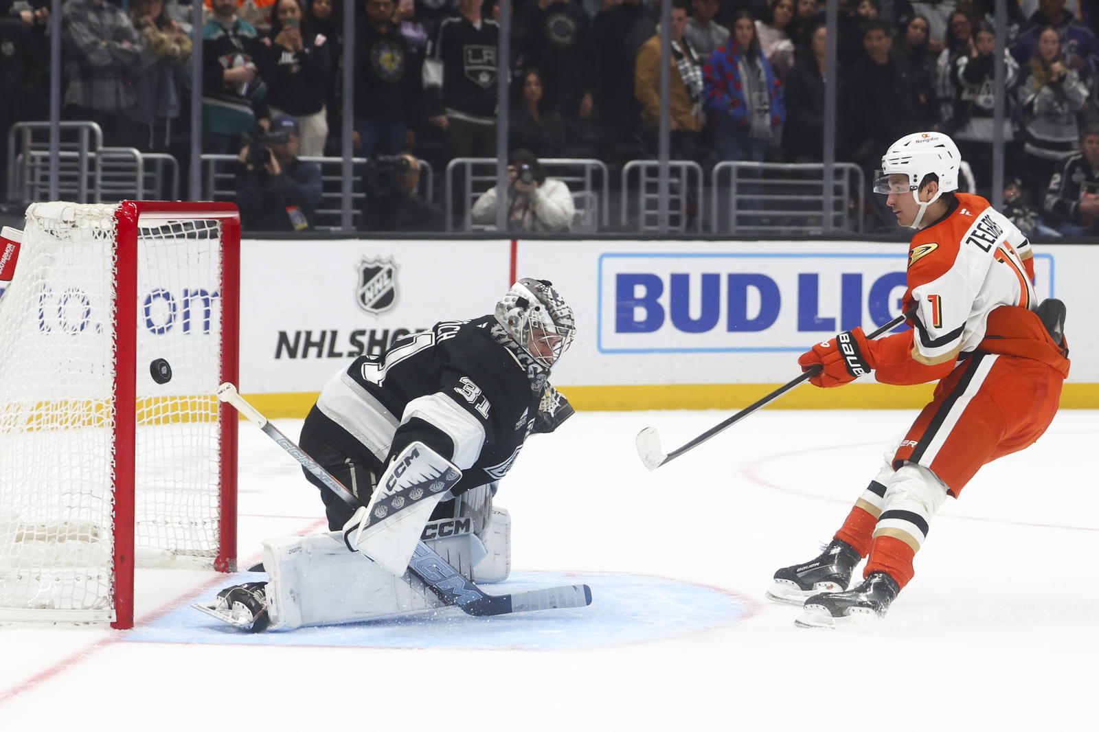 Feb 8, 2025; Los Angeles, California, USA; Anaheim Ducks center Trevor Zegras (11) scores a goal against Los Angeles Kings goaltender David Rittich (31) during a shootout at Crypto.com Arena. Mandatory Credit: Jessica Alcheh-Imagn Images