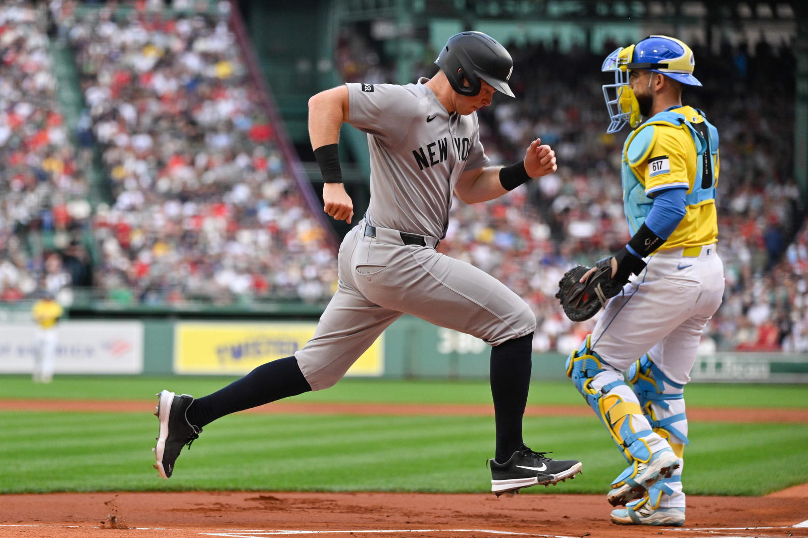 Sep 13, 2025; Boston, Massachusetts, USA; New York Yankees first baseman Ben Rice (22) scores a run against the Boston Red Sox during the first inning at Fenway Park. (Eric Canha/Imagn Images)