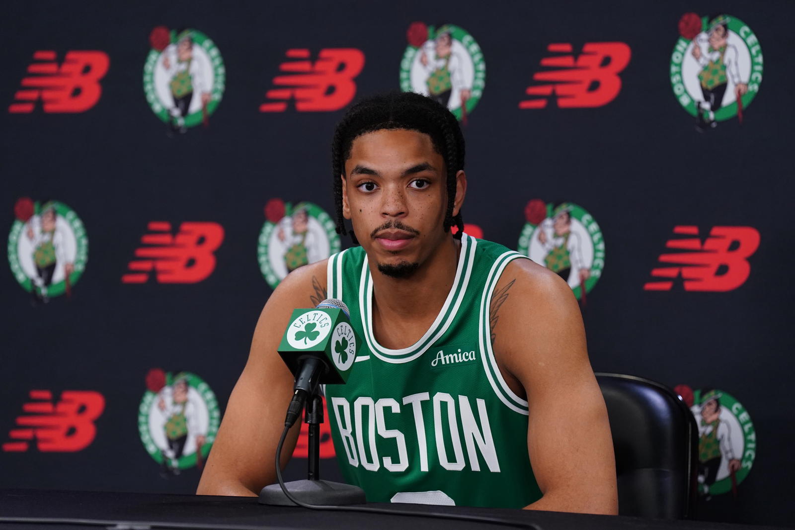 Sep 29, 2025; Boston, MA, USA; Boston Celtics forward Josh Minott (8) talks with reporters during media day at the Auerbach Center. (David Butler II/Imagn Images)