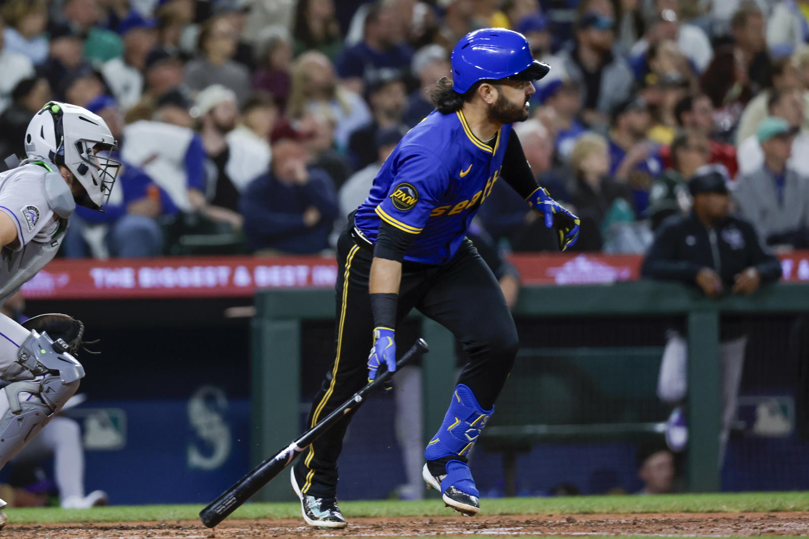 Seattle Mariners third baseman Eugenio Suarez (28) hits an RBI-single against the Colorado Rockies during the fifth inning at T-Mobile Park. Joe Nicholson-Imagn Images