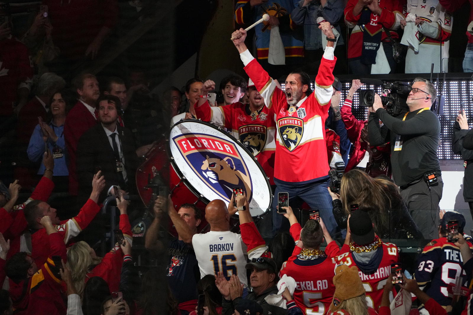 Jun 17, 2025; Sunrise, Florida, USA; Roberto Luongo, former player, bangs the drum before the start of game six of the 2025 Stanley Cup Final between the Florida Panthers and the Edmonton Oilers at Amerant Bank Arena. Mandatory Credit: Jim Rassol-Imagn Images