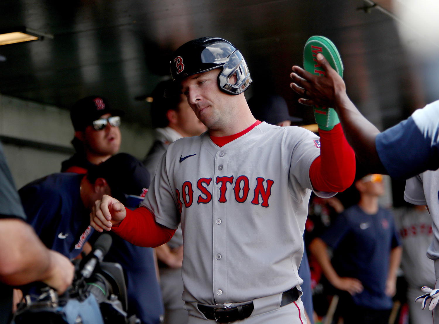 Sep 10, 2025; West Sacramento, California, USA; Boston Red Sox third baseman Alex Bregman (2) is congratulated by teammates after scoring a run against the Athletics during the third inning at Sutter Health Park. (Dennis Lee/Imagn Images)