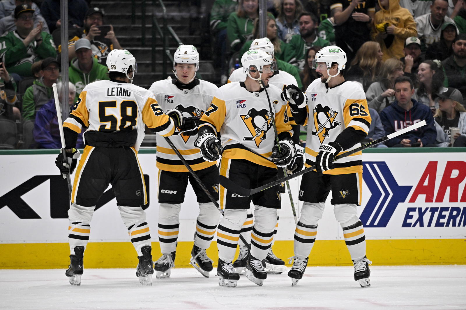 From left to right, Kris Letang, Rutger McGroarty, Sidney Crosby, Evgeni Malkin and Erik Karlsson (Jerome Miron-Imagn Images)